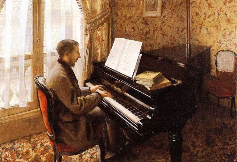 Молодой человек играет на пианино картина