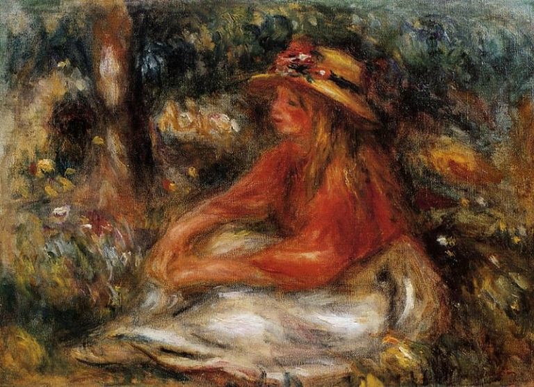Молодая женщина, сидящая на траве картина
